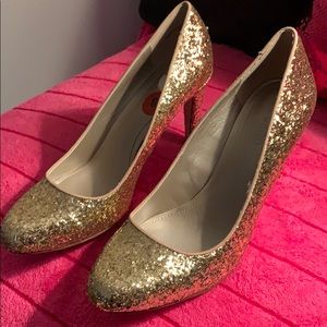 Gold glitter high heels